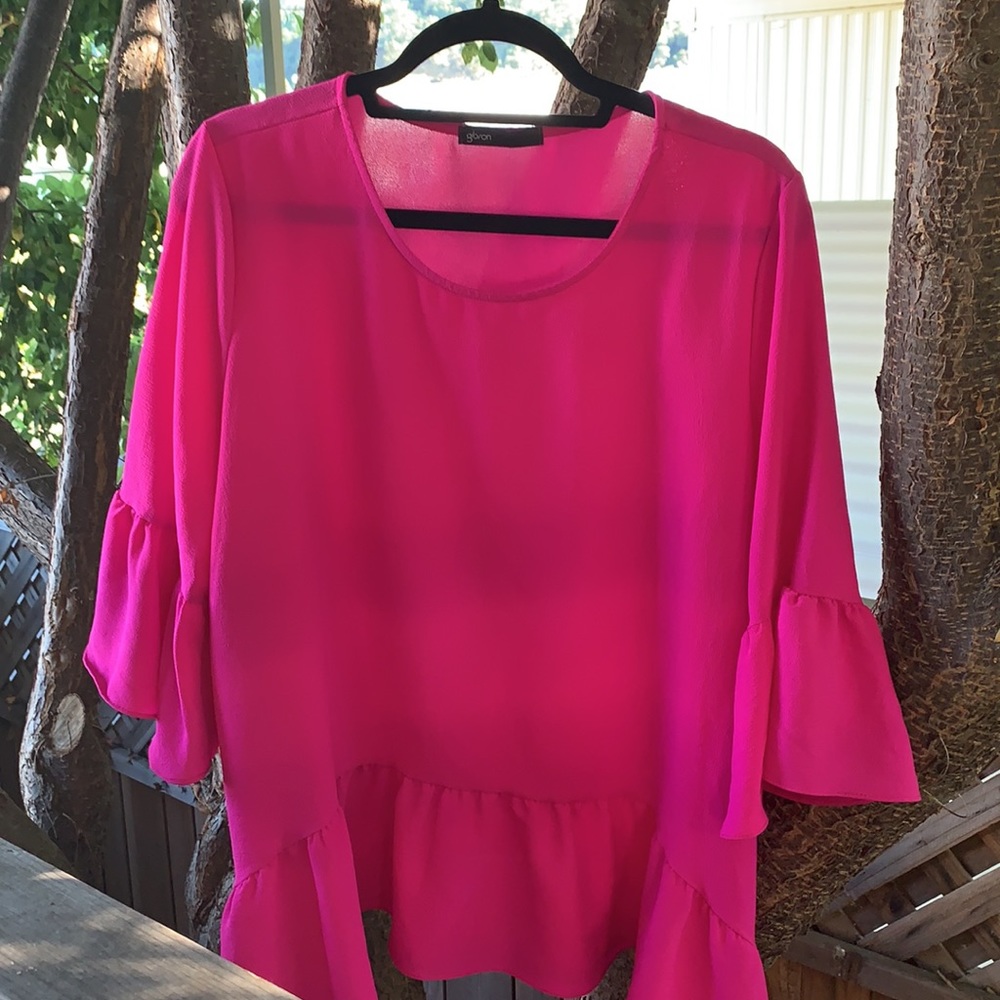 Fuchsia is blouse with ruffles